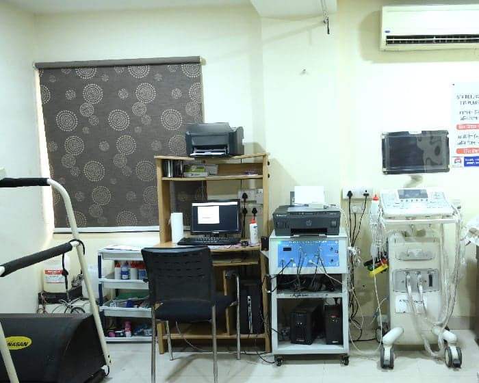 The cardiac testing room at Niramay Clinics with treadmill, ECG and echo machines