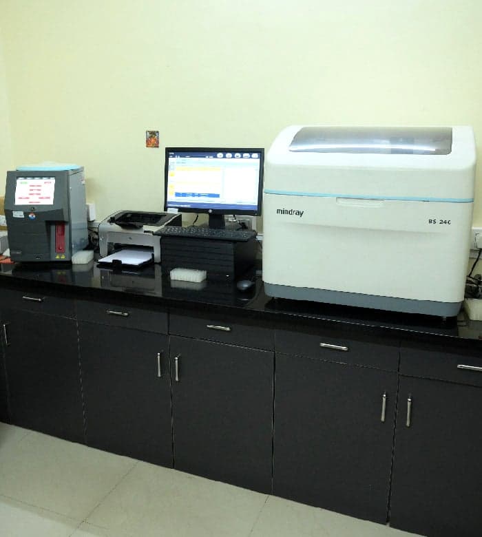 Laboratory analysers on the workbench at the Niramay Clinics in-house pathology lab